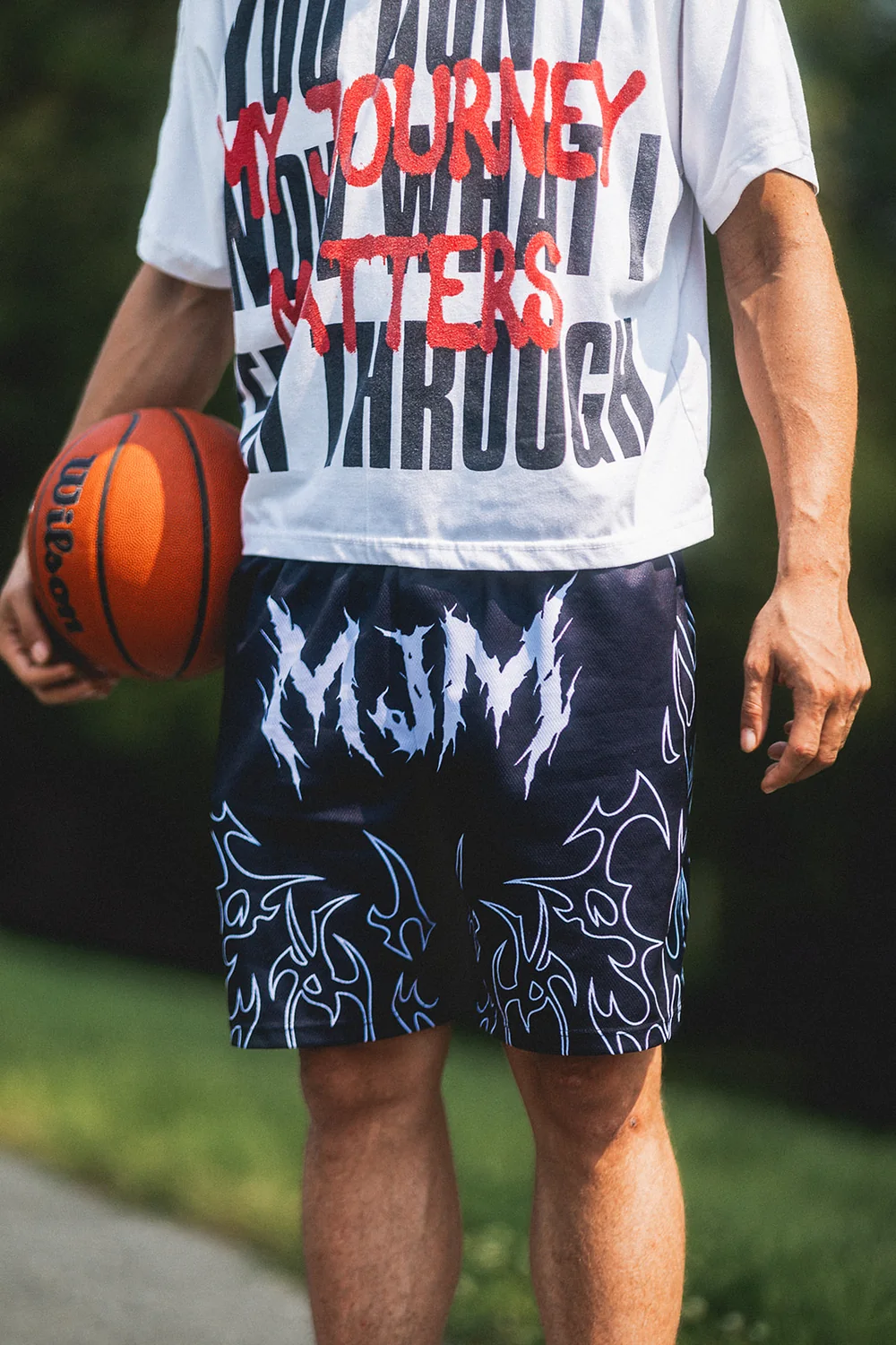 MJM Hoops apparel detail with basketball
